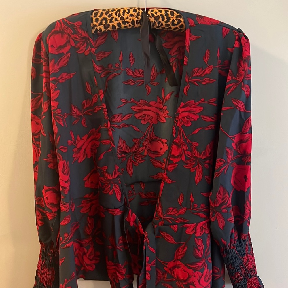 Red and blue long sleeved woman’s cover up